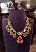 Load image into Gallery viewer, Beautiful coral beads Vinayaka necklace with orange beads and pairing with beautiful earrings
