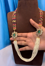Fancy party wear necklace with coloured stones and diamond look pendant