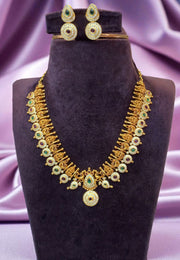 Traditional short kasula haram with green and pink combination