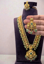 Traditional long haram with green beads and guttapusalu hangings