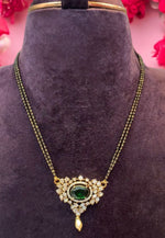 Load image into Gallery viewer, Beautiful black beads chain with green stone

