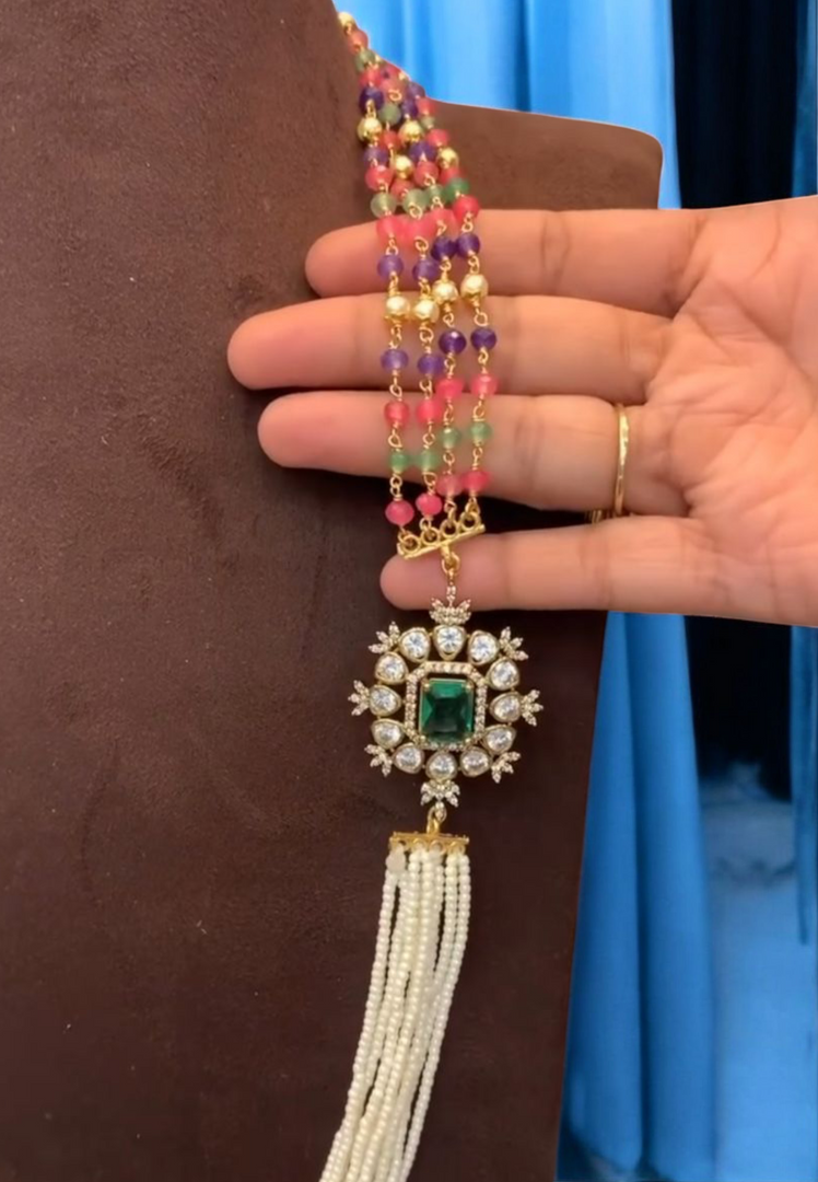 Fancy party wear necklace with coloured stones and diamond look pendant