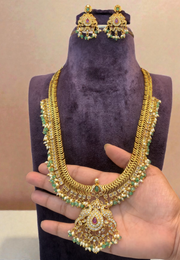 Beautiful jalebi pattern long haram with green beads