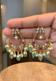 Simple chandbali earrings with uncut stone and purple colour stones and guttapusalu hangings