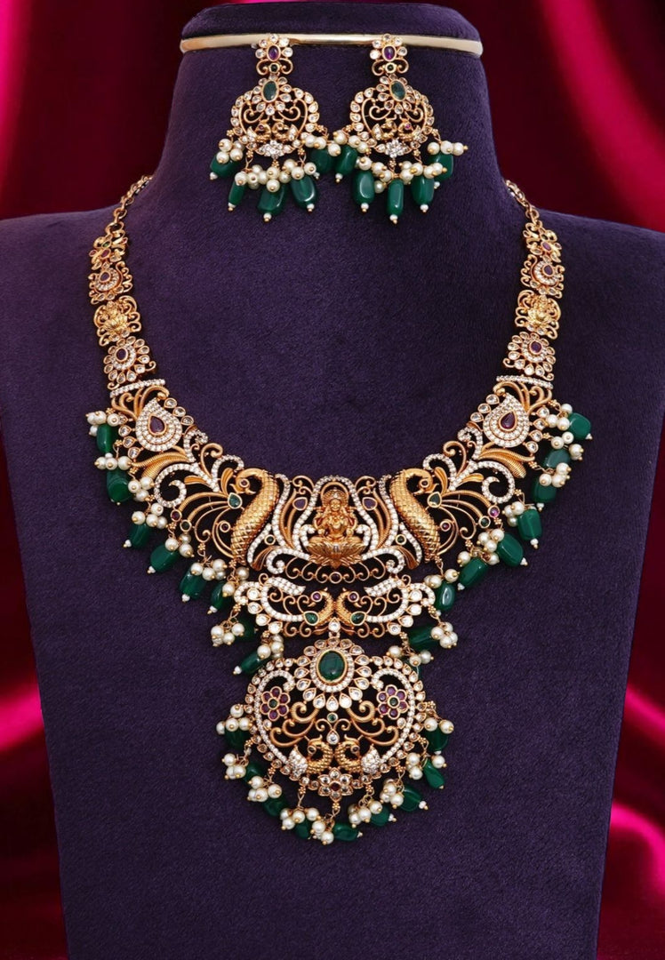 Beautiful short chain with green beads and god Laxmi Devi motive