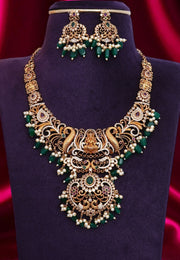 Beautiful short chain with green beads and god Laxmi Devi motive