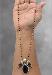 Beautiful black beads chain with purple stone pendant with peacock design