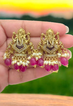 Load image into Gallery viewer, Traditional ganesh motive earrings with ruby colour beads - perfect for any occasion
