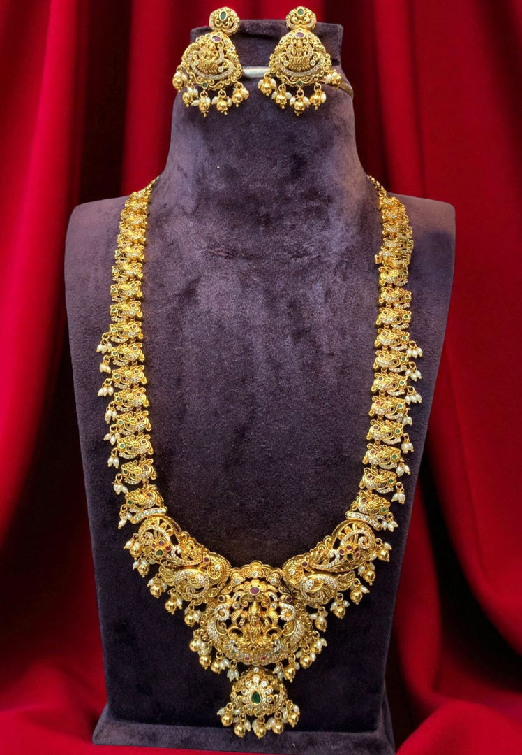 Traditional long haram with nakshi polish and Laxmi Devi motive pendant