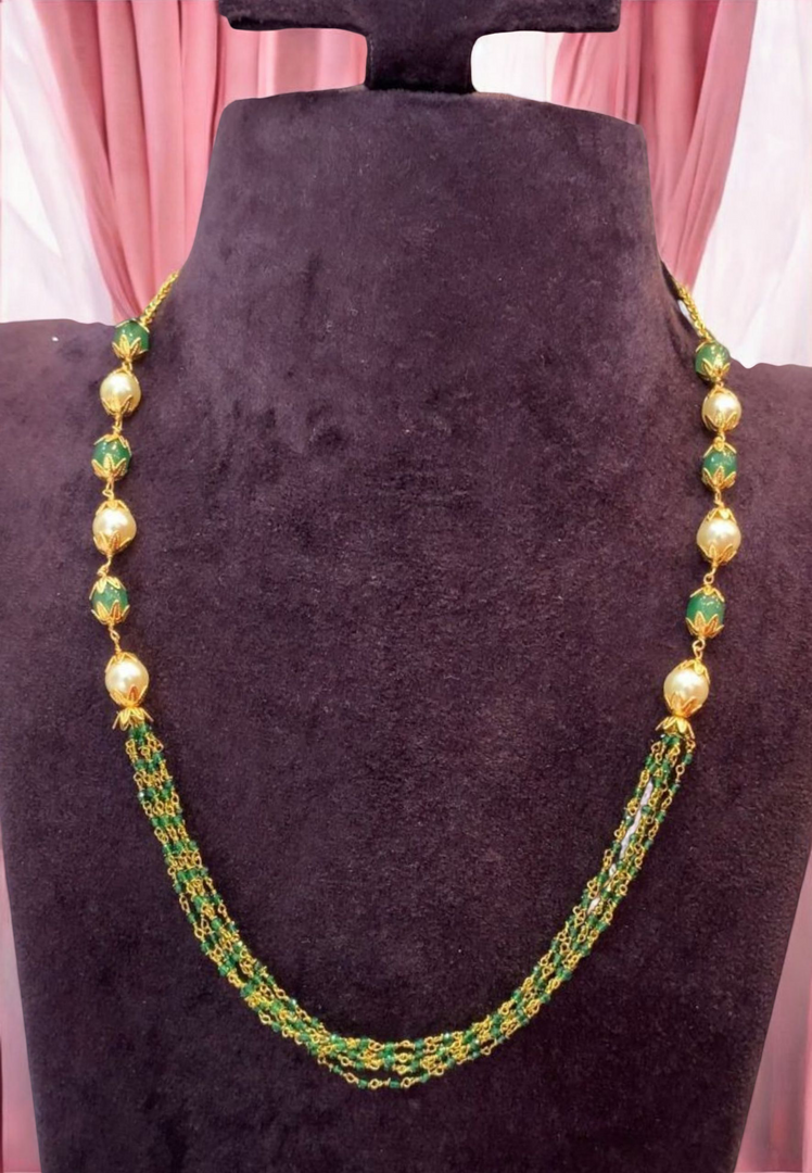 Beautiful pearls mala with green pearls and Golden balls