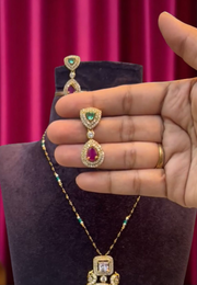 Beautiful chain with green and Ruby stone