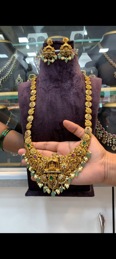 Beautiful long haram with green stone and guttapusalu hangings