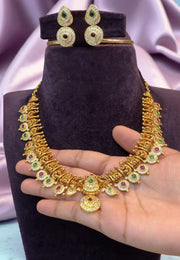 Traditional short kasula haram with green and pink combination