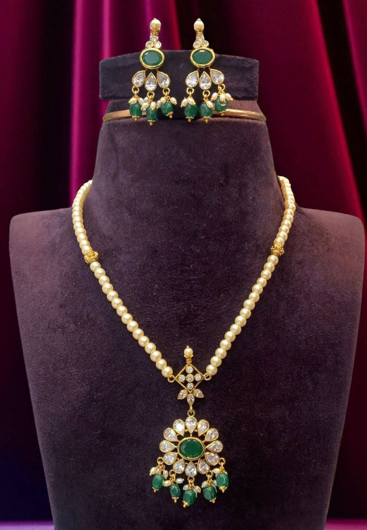 Beautiful pearls chain with green stone pendant
