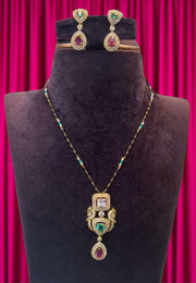 Beautiful chain with green and Ruby stone