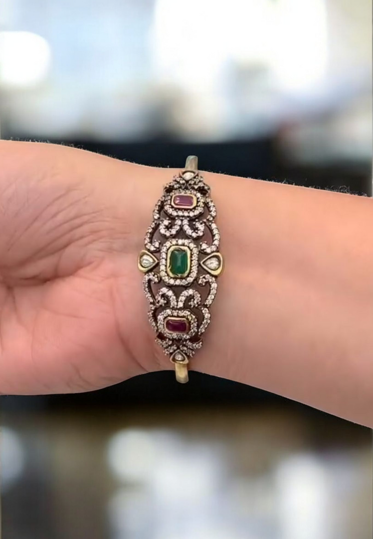 Beautiful fancy bracelet with green and Ruby stones