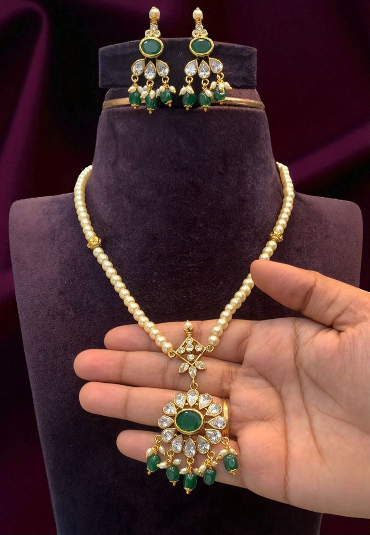 Beautiful pearls chain with green stone pendant