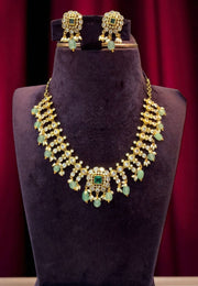 Beautiful short necklace with green beads and diamond replica stone