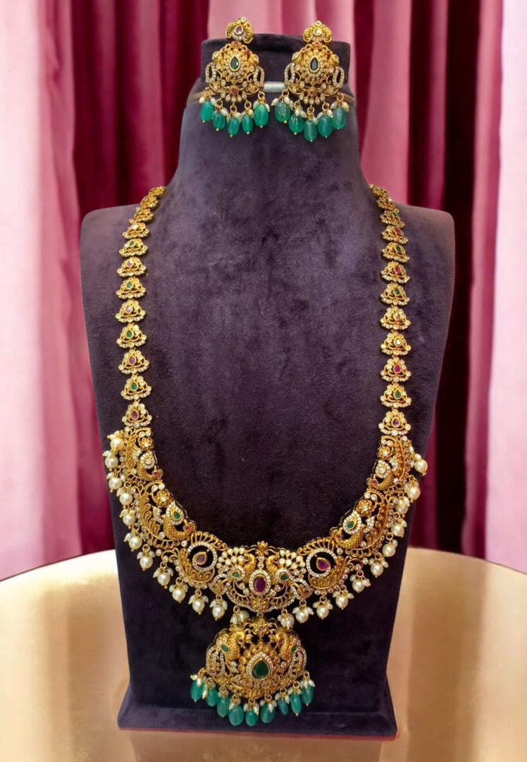 Traditional long haram with green stone and guttapusalu hangings