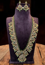Stunning antique victorian polish long haram with green stone and guttapusalu hangings