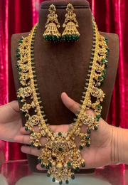 Beautiful long necklace with gold finishing and green stone