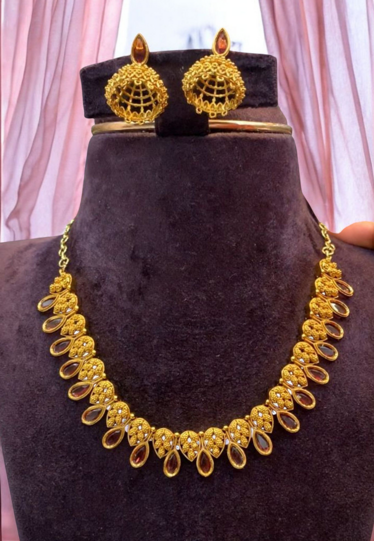 Beautiful traditional necklace with pink stone