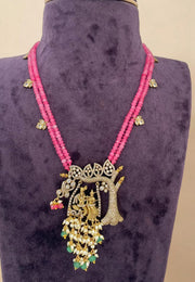 Beautiful beads haram with coral beads and radha krishna pendant