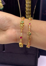 Beautiful bangles with green and pink stone