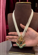 Load image into Gallery viewer, Stunning white beaded short haram with Lord Ganesha motive
