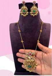 Stunning antic set with beautiful pendant with green and pink stone