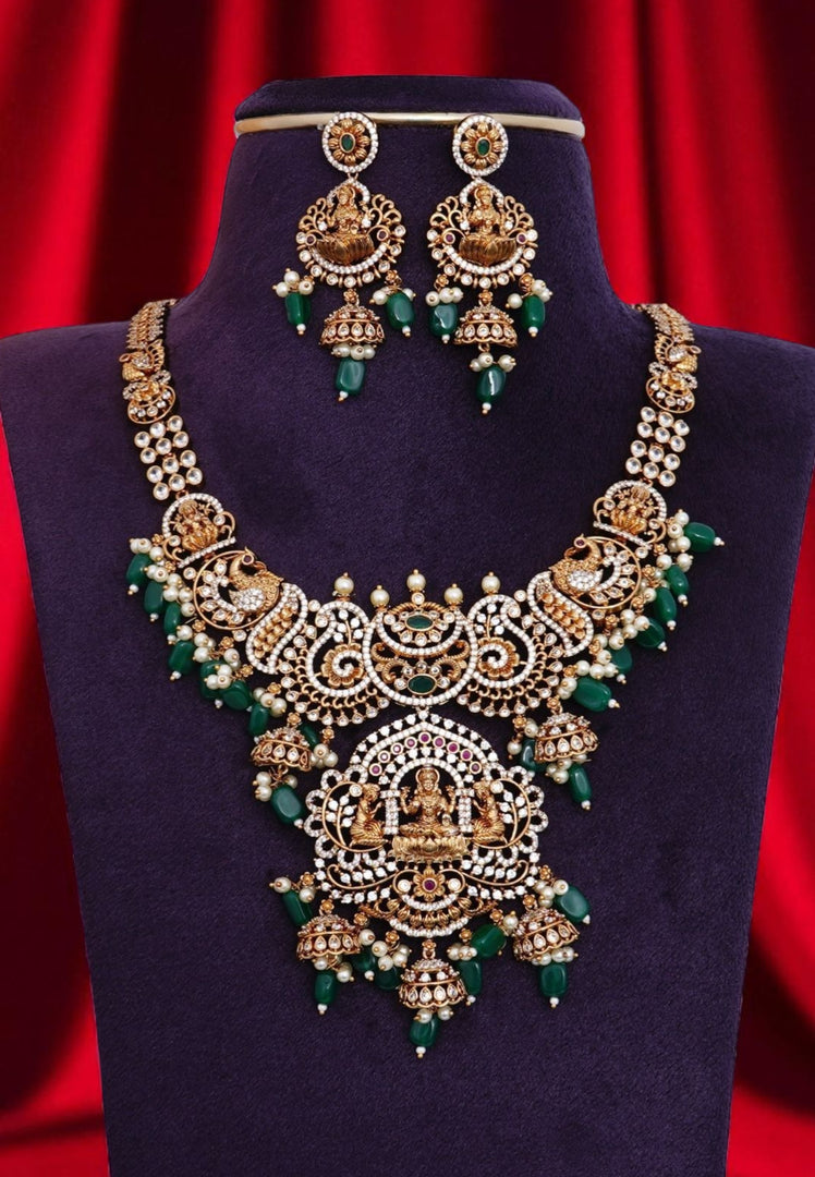 Beautiful short necklace with green beads and Laxmi Devi motive