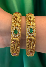 Load image into Gallery viewer, Stunning bangles with peacock design and green, ruby colour stones
