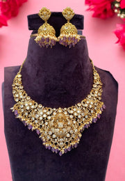 Beautiful kanti style necklace with God laxmi motive pendant with lavender beads and guttapusalu hangings
