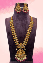 Traditional long nakshi haram with ruby colour stones and guttapusalu hangings