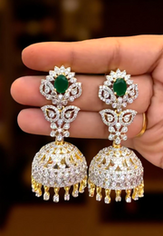 GJ polish jhumkas with green stone