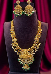 Beautiful short necklace with green Beads and god Laxmi Devi motive pendant