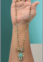 Load image into Gallery viewer, Beautiful black beads chain with blue stone pendant with elephant designed
