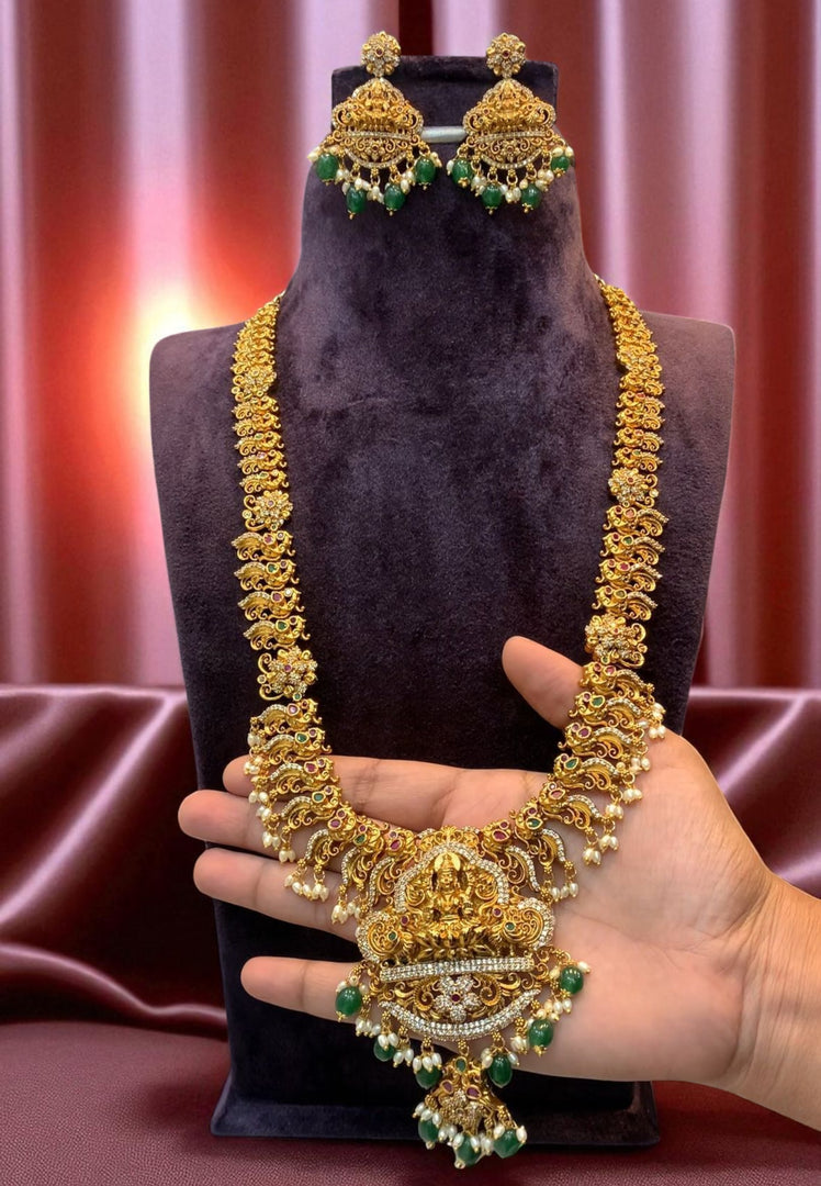 Beautiful long nakshi haram with green stone and guttapusalu hangings