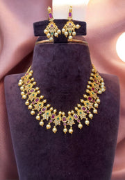 Beautiful short necklace with ruby and green colour stones -pairing with beautiful earrings