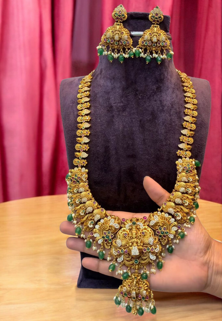 Traditional long Haram with God Lakshmi Devi motive and green beeds