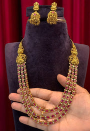 Beautiful three layer long haram with ruby stone and Laxmi Devi motive