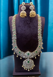 Beautiful long and heavy GJ polish necklace with green stone