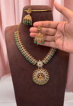 Load image into Gallery viewer, Beautiful short haram with gold finishing and green stone hangings
