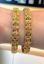 Load image into Gallery viewer, Beautiful gold finishing bangles with peacock design
