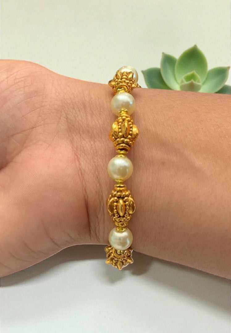 Beautiful handmade kada bracelet with gold balls and pearls