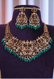 Beautiful short necklace with green beads and god Laxmi Devi motive