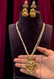Beautiful pearls chain with golden pendant and Laxmi Devi motive