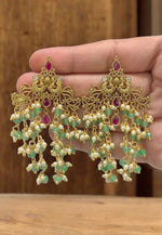 Load image into Gallery viewer, Beautiful earrings with peacock design and guttapusalu, green beads hanging
