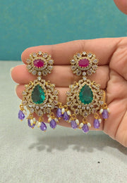Beautiful earrings with purple stone