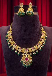 Beautiful short necklace with green beads and pink stone